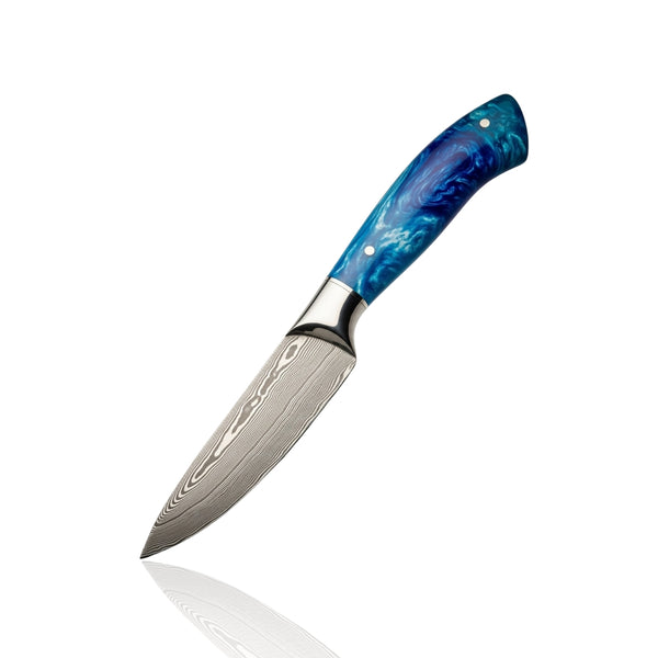 Damascus Paring Knife with vibrant blue swirled resin handle and wavy Damascus blade, displayed upright on a white background.