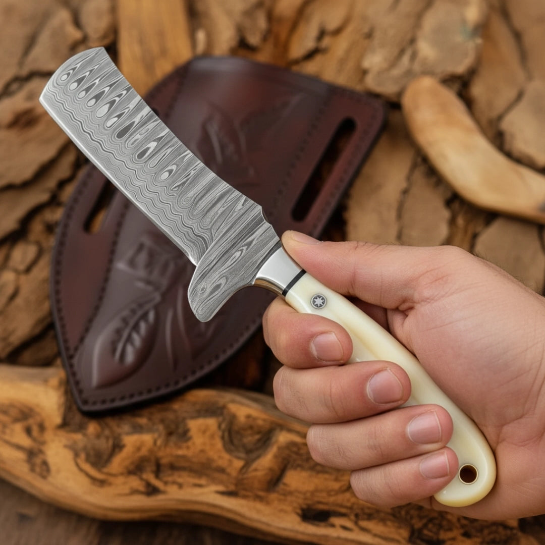 Hand holding 8 inch Damascus Cowboy Bull Cutter Knife with polished bone handle and leather sheath.