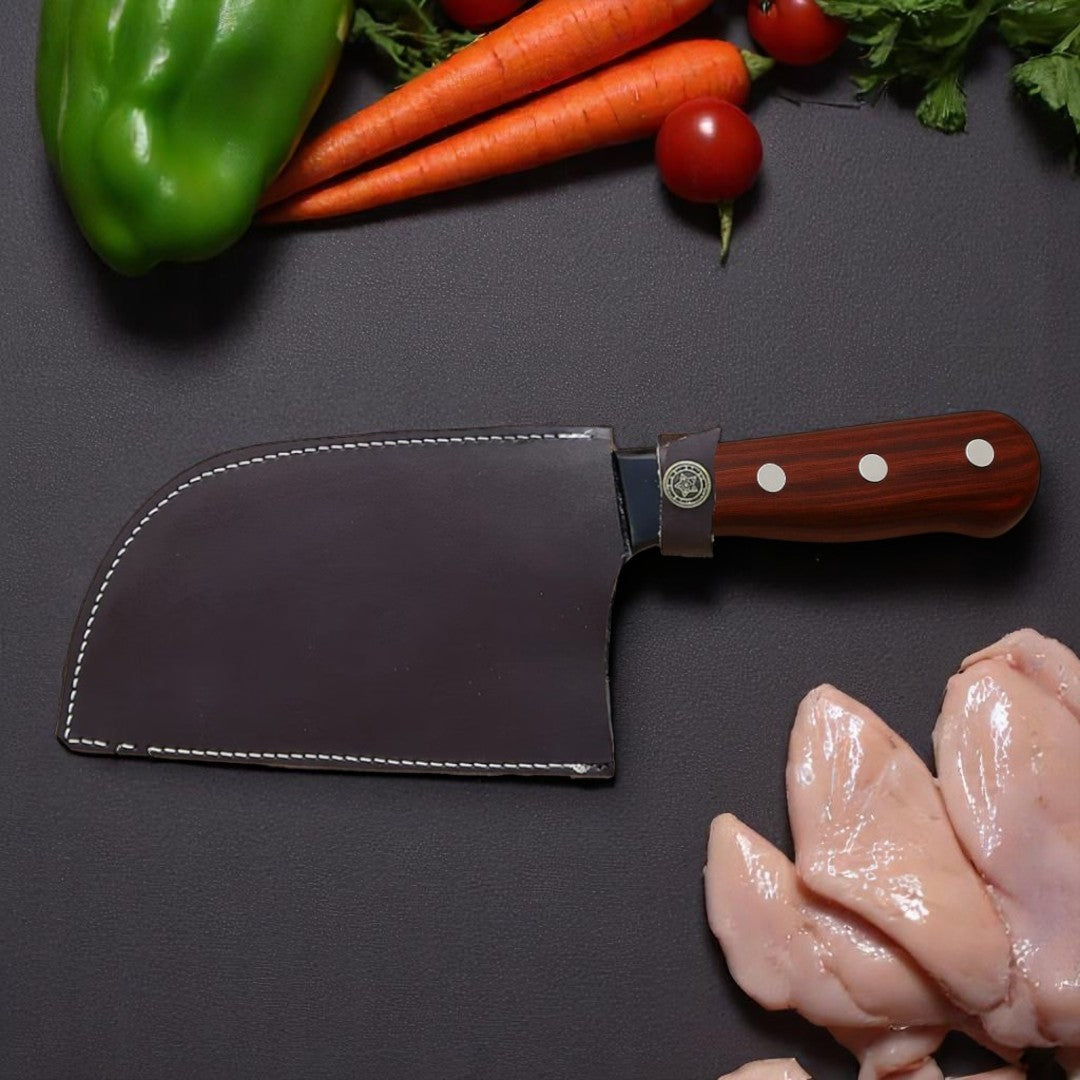 Classic Damascus Serbian Chef Knife with reddish-brown wood handle and wavy pattern blade, displayed upright next to its dark brown leather sheath on a white background