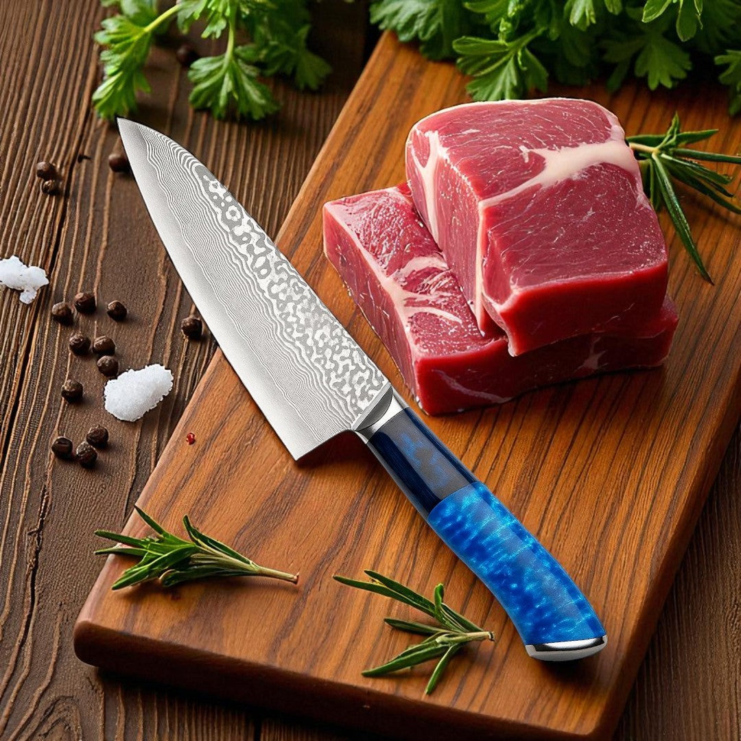 Raw meat on a wooden cutting board with a chef's knife and herbs.