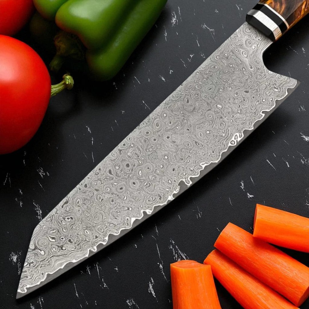 Damascus Kitchen knife on a black surface with vegetables