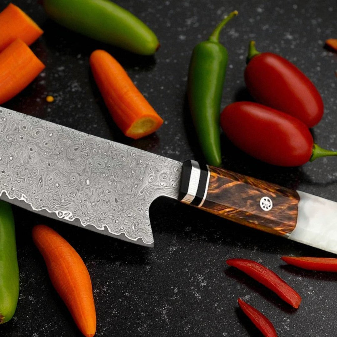 best Damascus chef's knife with a tortoiseshell handle on a dark surface with vegetables.