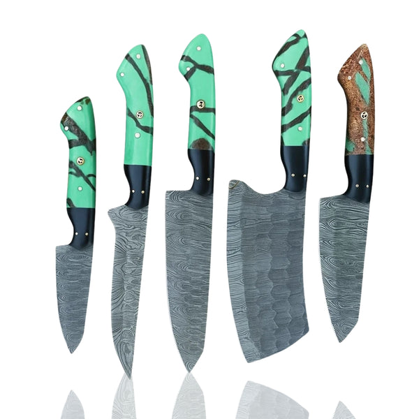  Five handmade Damascus steel chef knife set with unique green and brown/black swirled resin handles, displayed on green grass 