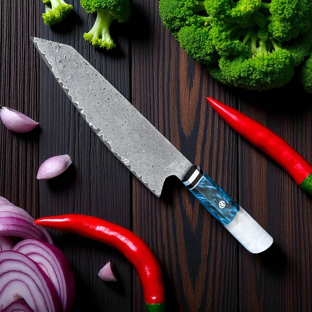 Chef's knife with a decorative handle on a wooden surface with vegetables