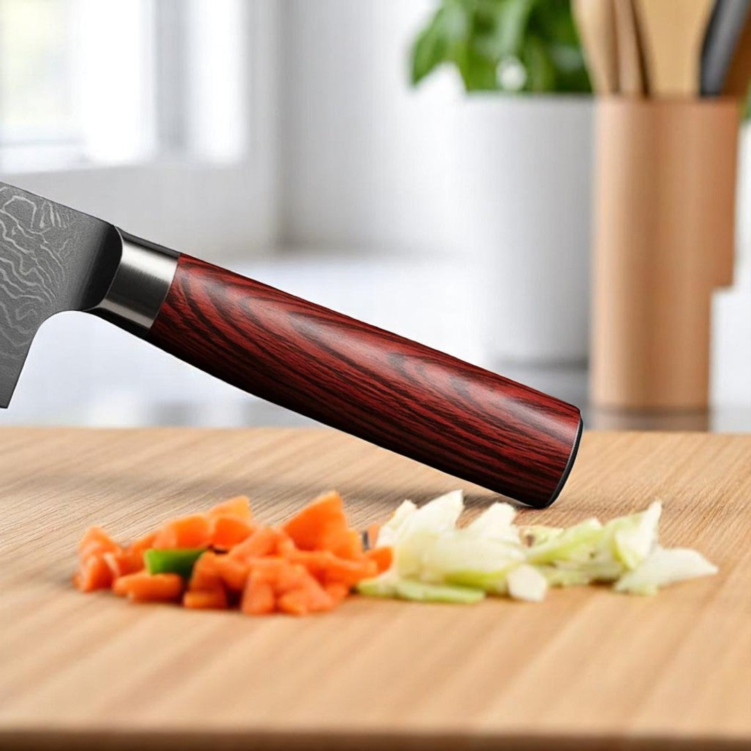 Close-up of reddish Pakkawood handle of a Damascus Santoku knife on a cutting board with chopped vegetables







