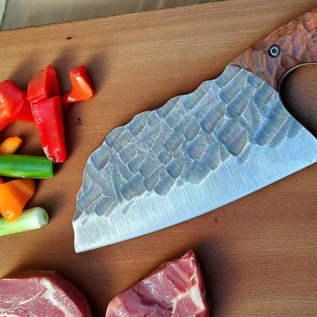 Bone Splitter Serbian Cleaver Knife with textured blade and walnut wood handle, resting on a wooden cutting board with chopped vegetables and garlic.
