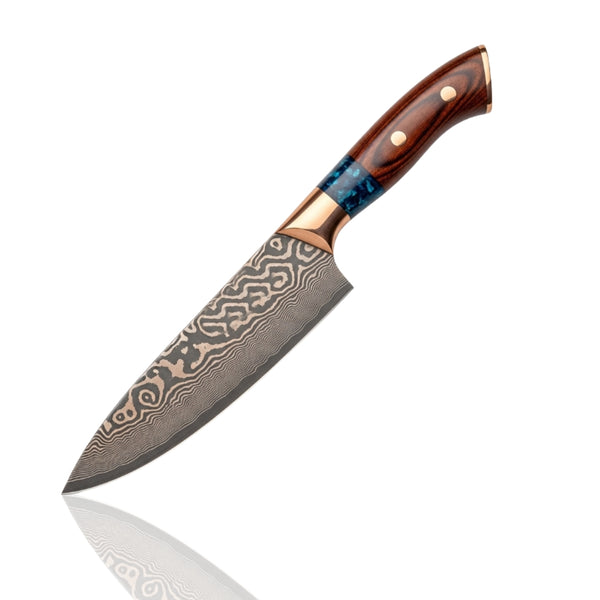 Damascus Chef Knife with multi-material handle (wood, blue resin, copper bolsters) and intricate wavy Damascus blade, standing upright on a white background.