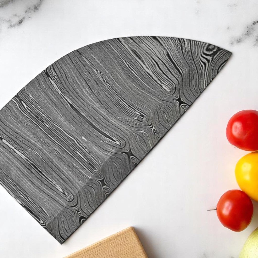  Serbian Cleaver Knife with blue swirled handle resting on a wooden cutting board, with fresh vegetables and kitchen elements in the background