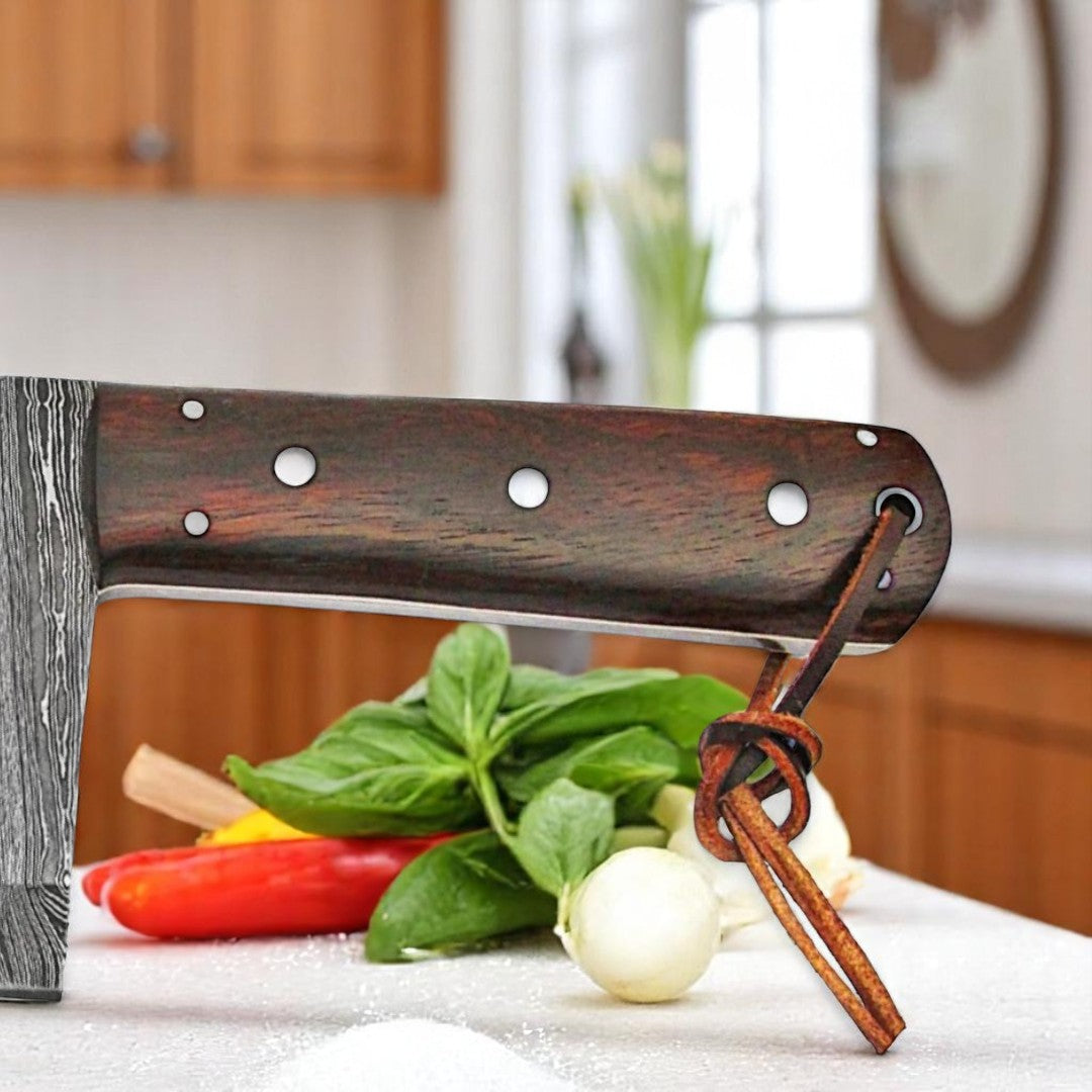 Close-up view of the classic reddish-brown wood handle with silver rivets on a Damascus Serbian Almazan Cleaver Knife