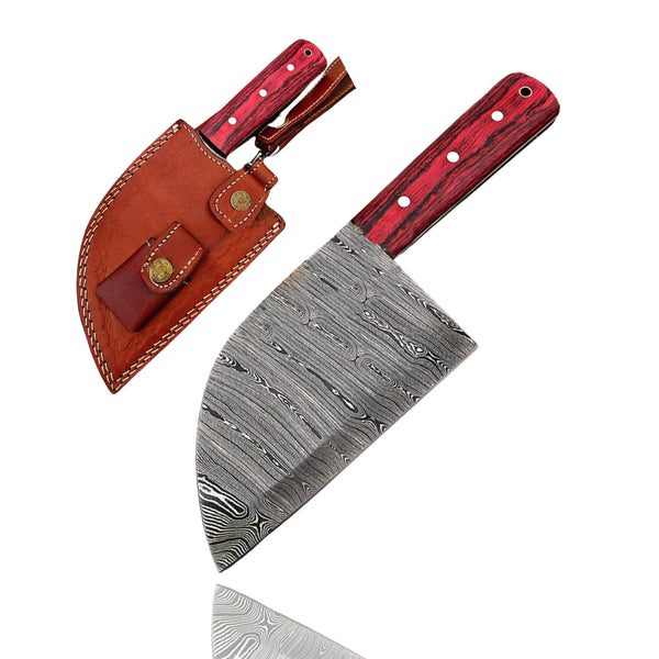 Handmade Damascus Steel Serbian Cleaver Knife with red Pakkawood handle, displayed upright next to its brown leather sheath on a white background